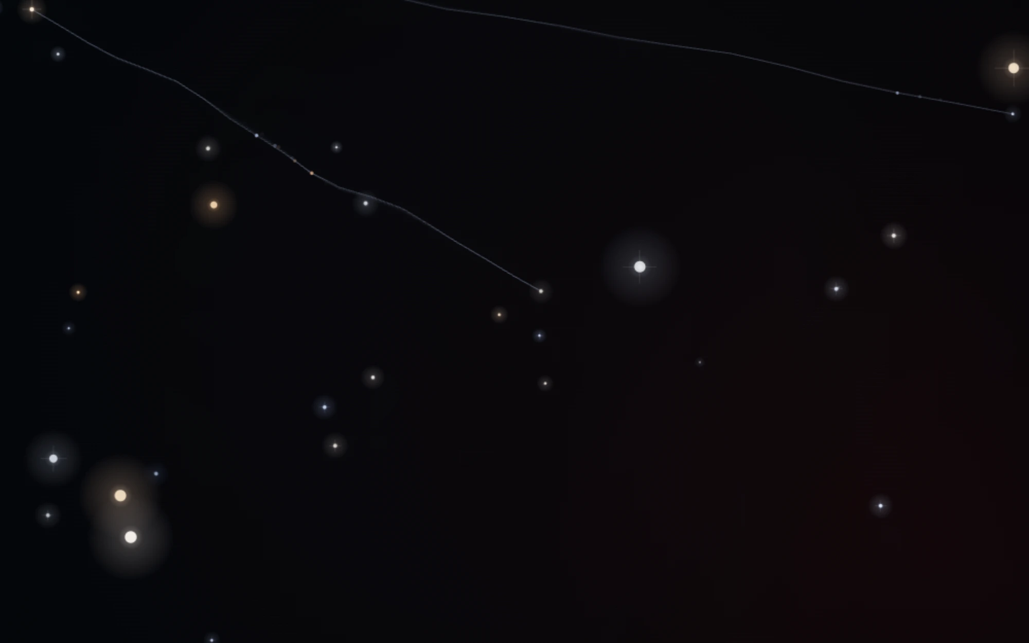 Small points of light drifting across a dark field